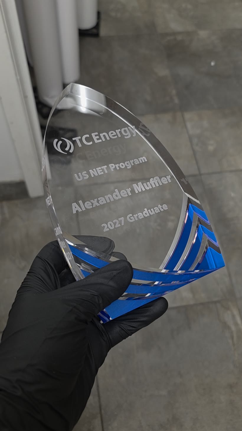 Etched crystal award and laser-engraved pieces