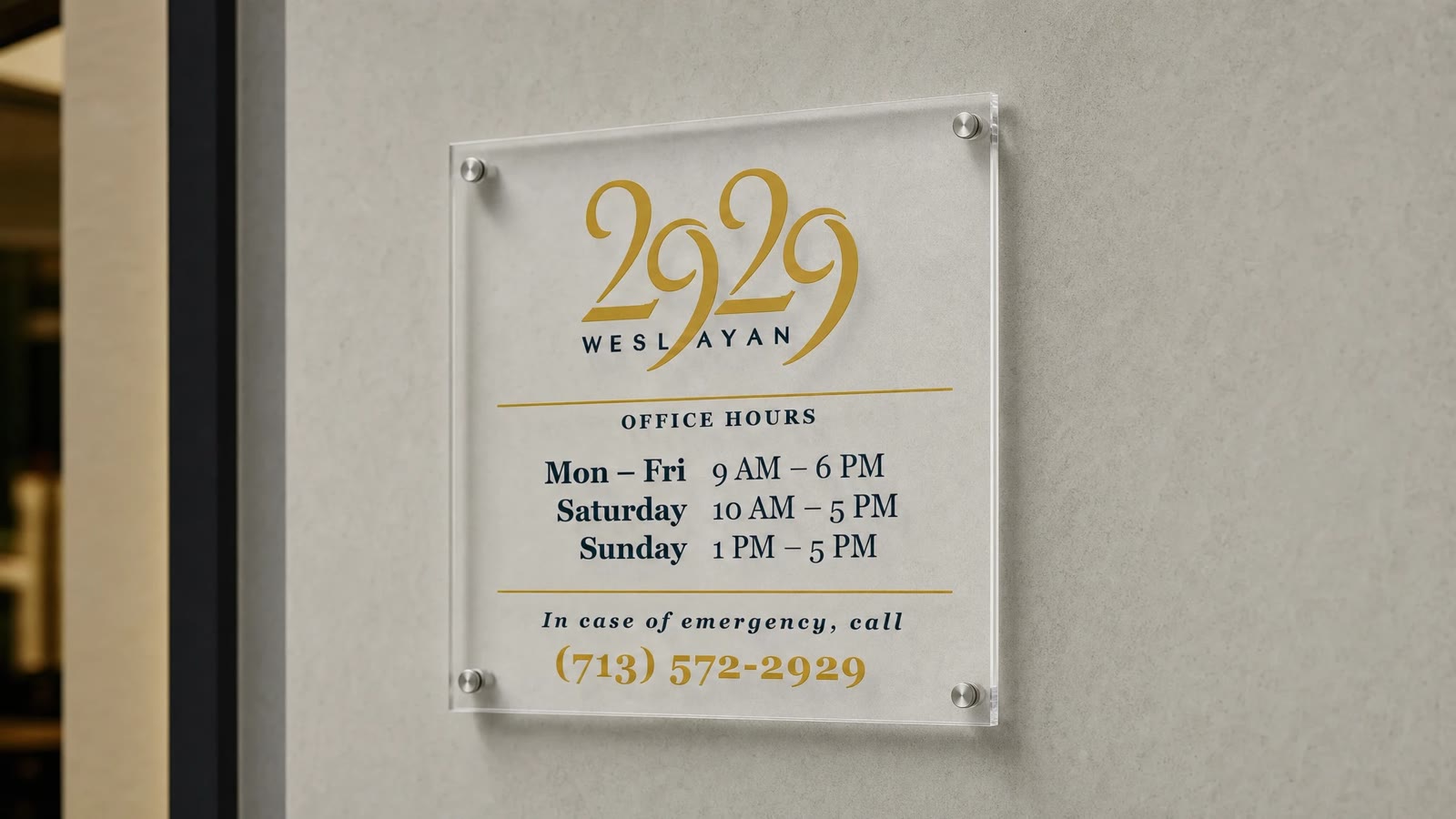 2929 Weslayan clear-acrylic sign mounted on standoffs